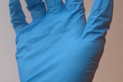 Disposable nitrile glove used for protective cleaning work
